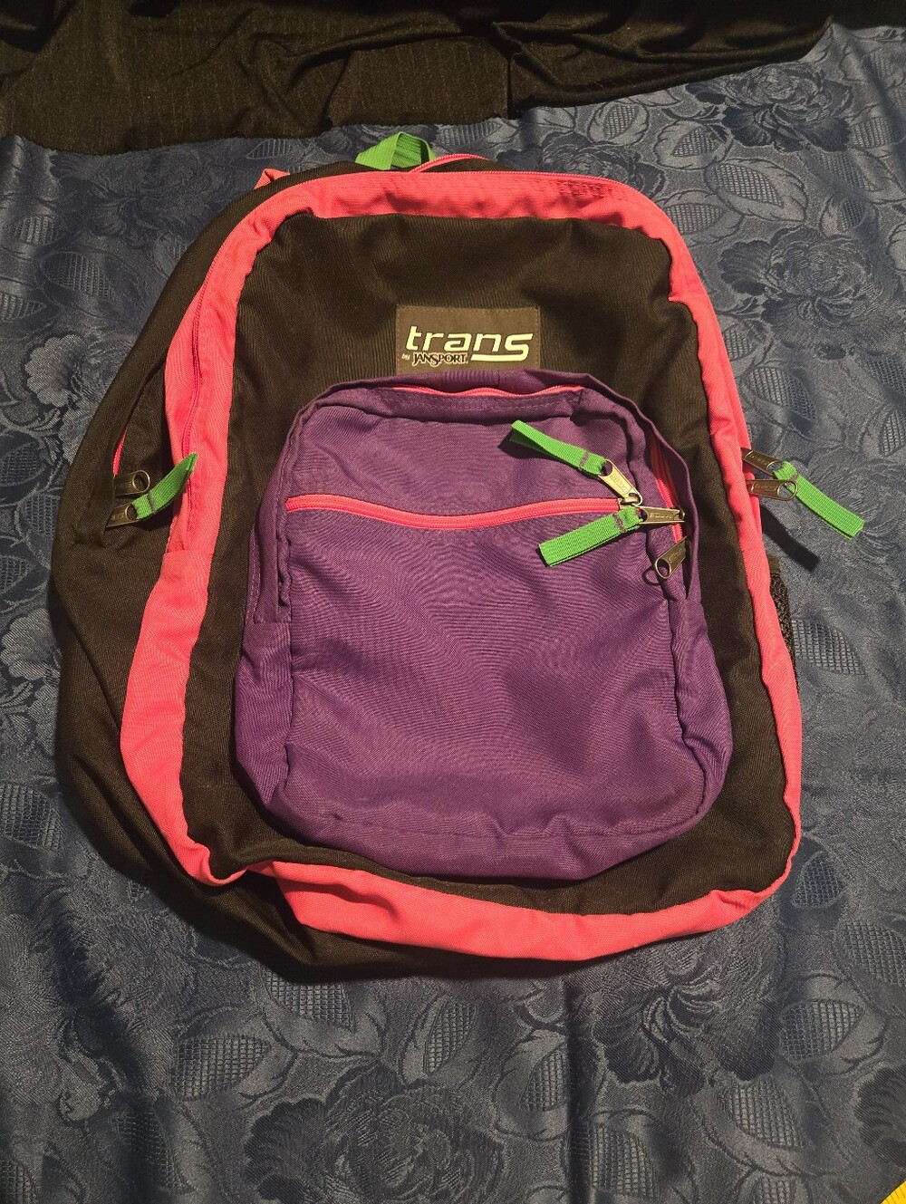 Jansport Black Backpack with Pink Trim and Purple Front Pocket